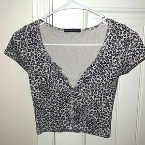 Brandy Melville blue cheetah zelly top. Fairly used but in good condition😁😁